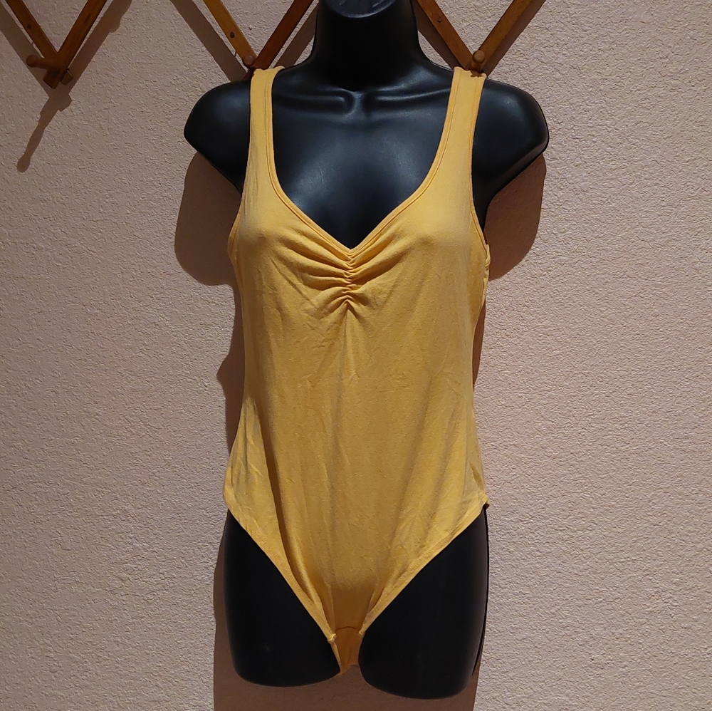 Yellow bodysuit